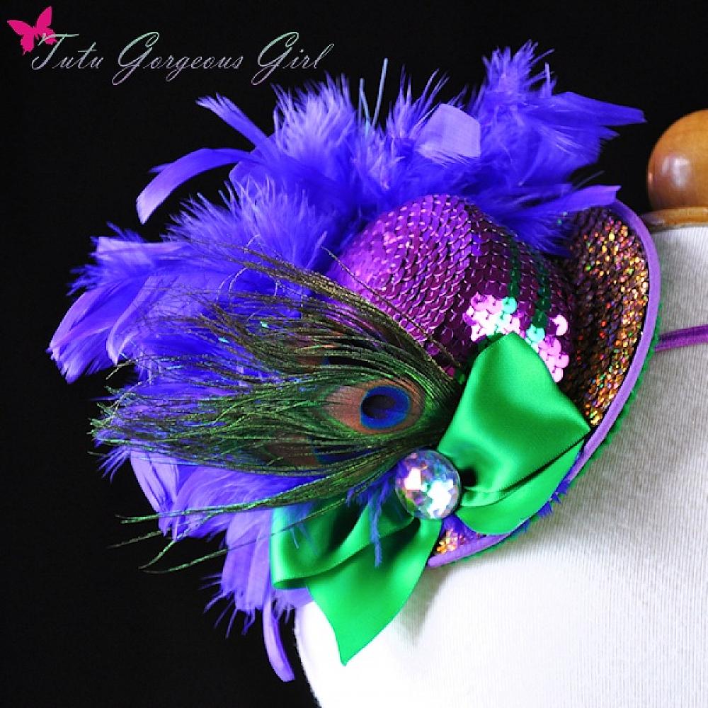 Handcrafted Mardi Gras mini top hat featuring peacock eye feathers